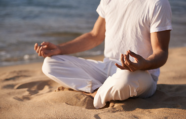 Image showing Meditation, hands with lotus and person on beach, mindfulness and zen with fresh air for calm outdoor. Ocean, seashore and travel with yoga for health, peace of mind and holistic healing for aura