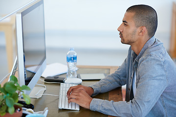 Image showing Business man, reading and planning on computer for creative project, research and online editing or copywriting. Professional editor, writer or young person typing on desktop for website and startup