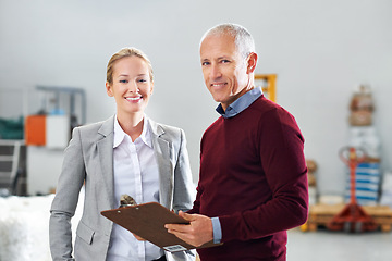 Image showing Checklist, teamwork or portrait of people in factory for stock in workshop, supply chain or production. Woman, clipboard or happy managers in warehouse for industrial process, inspection or resources