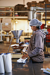 Image showing Manufacturing, woman and coffee packaging in factory with export service, career and production process. Business, worker and employee with bags, weighing tool or supply chain industry in warehouse