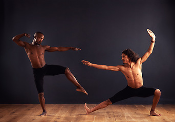 Image showing Performance, people and contemporary in dance studio for training, competition and routine. Collaboration, balance and diverse young men for professional, practice and workout with dark background