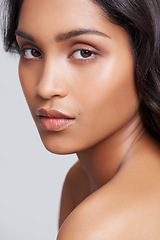 Image showing Skincare, confident and portrait of woman with glow in studio for health, wellness and natural routine. Beauty, cosmetics and face of female person with dermatology treatment by gray background.