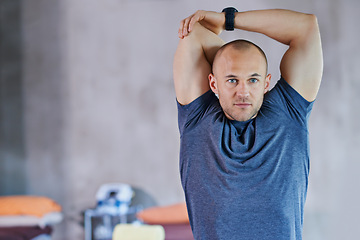 Image showing Athlete, man and stretching for fitness, exercise and workout performance for competition. Male person, healthcare and wellness with sport as hobby, daily routine and cardio for warm up or muscle