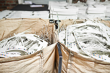 Image showing Bag, paper and recycle in factory for printing, product and industry for manufacturing and distribution. Cardboard waste and stock for production process, assembly line and supply chain in warehouse