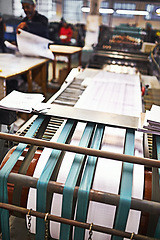 Image showing Vintage, printing and machine for production in warehouse for supply of newspaper with automated operations. Retro, plant and system in factory with manufacturing for distribution of newsletter