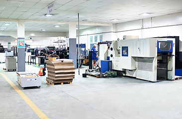 Image showing Printing, manufacturing or distribution in factory for logistics or operations, industrial or wholesale or production with machine. Technology or supplier and plant, business and working with system