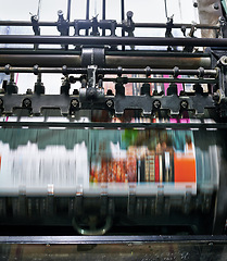 Image showing Printing, factory and machine with speed, documents and media for publication, magazine and newspaper. Industrial, printer and production for distribution, publishing and press equipment in warehouse