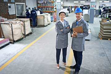 Image showing Manager, smile and portrait in factory for production process, industry and manufacturing for distribution. Workers in uniform together in packaging plant for printing and stock in bag for supplier