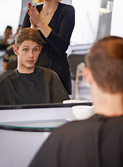 Image showing Confident, man and female hairdresser in salon for grooming, styling and haircut. Woman, beauty shop and male customer in chair for treatment, blow out or conditioning looking at reflection in mirror