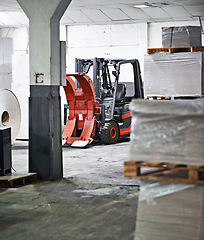Image showing Warehouse, forklift and manufacturing with distribution of package for wholesale, delivery and supplier. Logistics, storage and factory with machines or equipment for distribution in storehouse