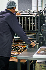 Image showing Man, printing factory and production manufacturing or industrial process for wholesale, packaging or newspaper. Male person, back and warehouse engineer or quality control, distribution or supplier