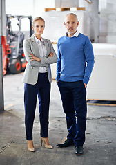 Image showing Business people, man and woman in portrait at warehouse, confident or pride for startup project. Collaboration, creative career or designers in factory for printing material or distribution industry