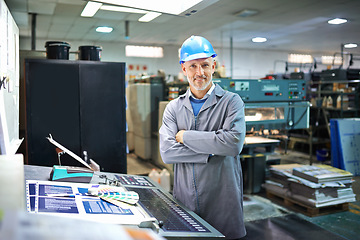 Image showing Portrait, confident and manager in factory with machine for printing, equipment maintenance and production supervisor. Male person and industrial warehouse for manufacturing or distribution of paper.