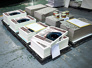 Image showing Books, pallet and floor in factory with commercial design for printing, manufacturing and stock for publications. Print material and paper in warehouse for copyright, distribution and supply chain