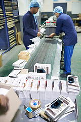 Image showing People, printing factory and paper production or manufacturing process for flyer, newspaper or publishing. Men, teamwork and warehouse distribution with equipment for business, supplier or career