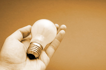 Image showing Background with lit lightbulb