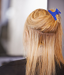 Image showing Woman, ready and hair care in salon, back and keratin treatment or dye for grooming. Female person, beauty and prepare for makeover transformation at hairdresser, cosmetics and pamper client