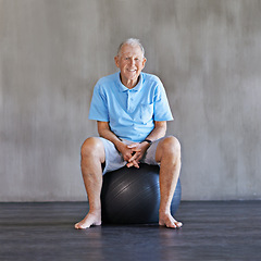 Image showing Elderly man, exercise ball and portrait in studio on mockup space with physical therapy, workout and practice. Senior person, training sphere and fitness for health with wellness for wellbeing