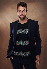 Image showing Man, model and fashion in studio portrait, style and male person isolated on brown background. Clothing, confident and backdrop space with pose, casual and trendy outfits for Brazilian apparel.