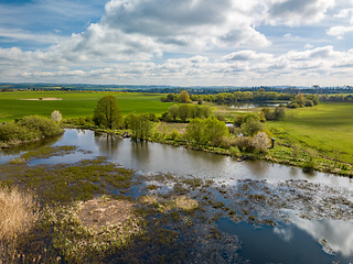 Image showing Beautiful spring landscape with small pond.