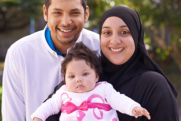 Image showing Muslim family, garden and portrait of parents with baby for bonding, relationship and outdoors together. Islam, happy and mother, father and newborn infant for love, childcare or support in park