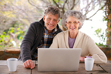 Image showing Elderly couple, smile and portrait with laptop for internet and online for relax or rest in garden for retired. Pensioners or senior and sitting with tech for streaming, web and unwind with coffee