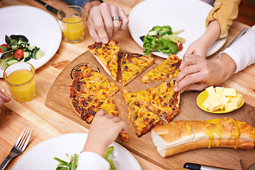 Image showing Hands, pizza and top view of family eating food at table in home for lunch or hungry for bread. Margherita, group and people with mozzarella slice for dinner with salad on plate, cheese and closeup