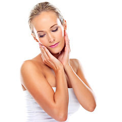 Image showing Makeup, skincare and woman with beauty in studio for glow, shine and health isolated on a white background. Face, hands and blonde model touch skin for cosmetics, dermatology and thinking of body