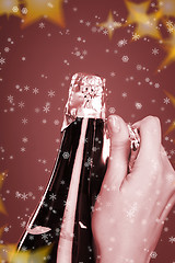 Image showing Opening champagne bottle