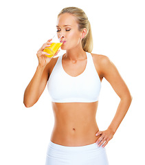 Image showing Studio, athlete and woman with juice to drink and benefits of vitamin c with nutrition for female person. White background, wellness and girl with energy for sports with training, exercise or workout