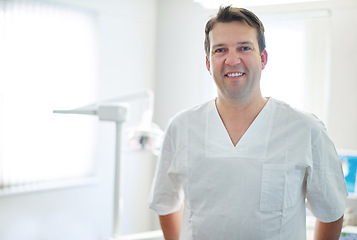 Image showing Man, portrait and dentist for teeth appointment or wellness consultation or cleaning hygiene, oral or equipment. Male person, face and employee for healthy insurance or gum clinic, results or checkup