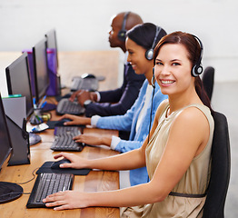 Image showing Happy woman, portrait and call center with computer for tech support, help desk and customer service agency. Telecom, CRM and happy consultant for telemarketing, contact us and advice at workplace