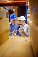 Image showing Inventory, stock and employees using tablet in distribution warehouse for shipping company with inspection. Man, woman and hard hats in factory for wholesale supplier in freight, retail and industry.