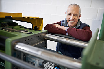 Image showing Mature man, factory and machine with warehouse, smile and manufacturing industry maintenance. Engineer, tradesman and system with equipment, repair and happiness with contractor career or job