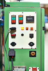 Image showing Control panel, factory and equipment with closeup, technology and manufacturing industry maintenance. Professional tech, switch and system with machine, repair and monitor with electronic engineering