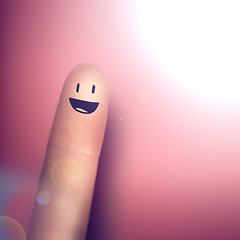 Image showing Funny, face drawing and smile on finger in studio isolated on a pink background mockup space. Happy, index and creative hand gesture, sign or pointing at emoji closeup with lens flare on a backdrop