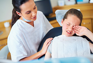 Image showing Fear, dental or crying girl with dentist in toothache consultation, problem or crisis. Pediatric dentistry, comfort or kid with stress, anxiety or tears for root canal, crown or extraction phobia