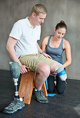 Image showing Physiotherapist, rehabilitation and prosthetic leg in clinic for support, physiotherapy, and stretching. Physical therapist, help and training person with disability for wellness, therapy and health