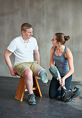 Image showing Man, woman and physiotherapy with prosthetic, session and leg at rehabilitation, exercise and training. Physiotherapist, patient and fitness for workout routine, health and wellness for disability