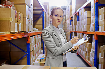 Image showing Portrait, clipboard or business woman at a warehouse for logistics, planning or inventory. Face, factory or employee with cargo, checklist or stock storage compliance documents for quality assurance