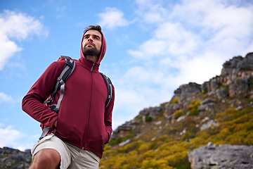 Image showing Man, hiking and mountain with bag in nature, Germany trail for conservation. Active, male person on adventure for health and wellness, confident explorer on backpacking for outdoor sport or walk