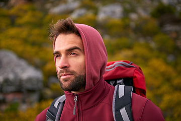 Image showing Man, mountain and hiking in nature for fitness, wellness and exercise for training and adventure in environment. Young person with backpack in outdoor for workout and trekking in morning for travel