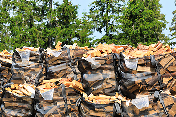 Image showing Stacked Bags of Cut Firewood