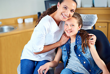 Image showing Portrait, girl and dentist with child, woman and consultation for medical procedure and oral health. Face, professional and kid with employee and dental hygiene with care and trust with appointment