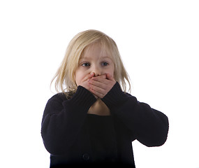 Image showing Child Covering Mouth in Surprise