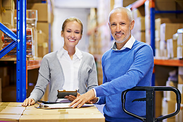 Image showing Portrait, warehouse and man with woman, tablet or documents with shipping form or cargo. Supply chain, factory or manufacturing with teamwork or boxes with stock or logistics with storage or industry