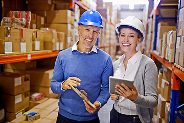 Image showing Portrait, warehouse and man with woman, tablet and paperwork with shipping form and cargo. Supply chain, factory or manufacturing with boxes and industrial with stock, smile or logistics with storage