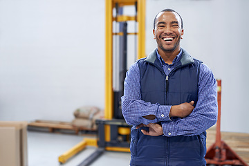 Image showing Man, smile and portrait in factory for production process, industry and manufacturing for distribution. African person or worker and happy with forklift for stock and supply for service and work