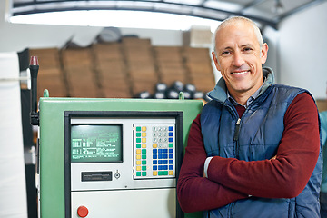 Image showing Engineer, warehouse and machine with control panel, smile and manufacturing industry maintenance. Professional man, tradesman and system with equipment, repair and happiness for factory career or job