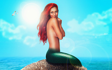 Image showing Mermaid, sea and rock with beauty, portrait and smile for fantasy, fairytale and mythical in ocean. Aquatic, female creature, mystical and siren in mythological, dream and magical for folklore